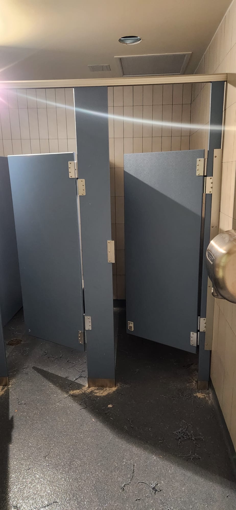 Solid-plastic commercial restroom stalls at Buchanan-Verplanck Elementary School in Buchanan, New York