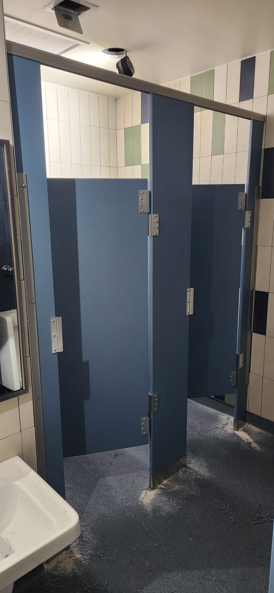 Solid-plastic commercial restroom stall doors at Buchanan-Verplanck Elementary School in Buchanan, New York