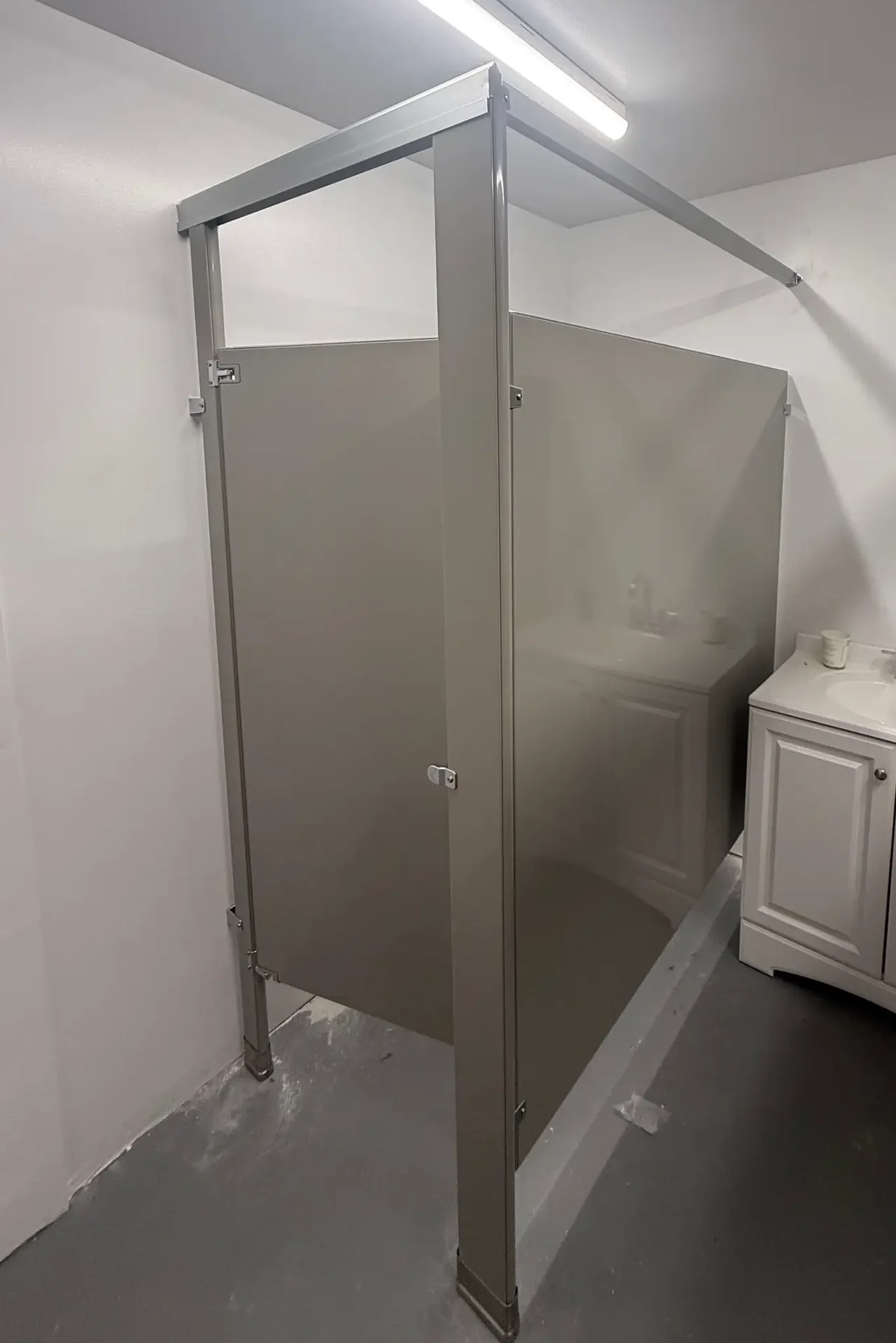 Powder-coated-steel commercial restroom stall at Cine Magic LIC Studios in Long Island City, New York