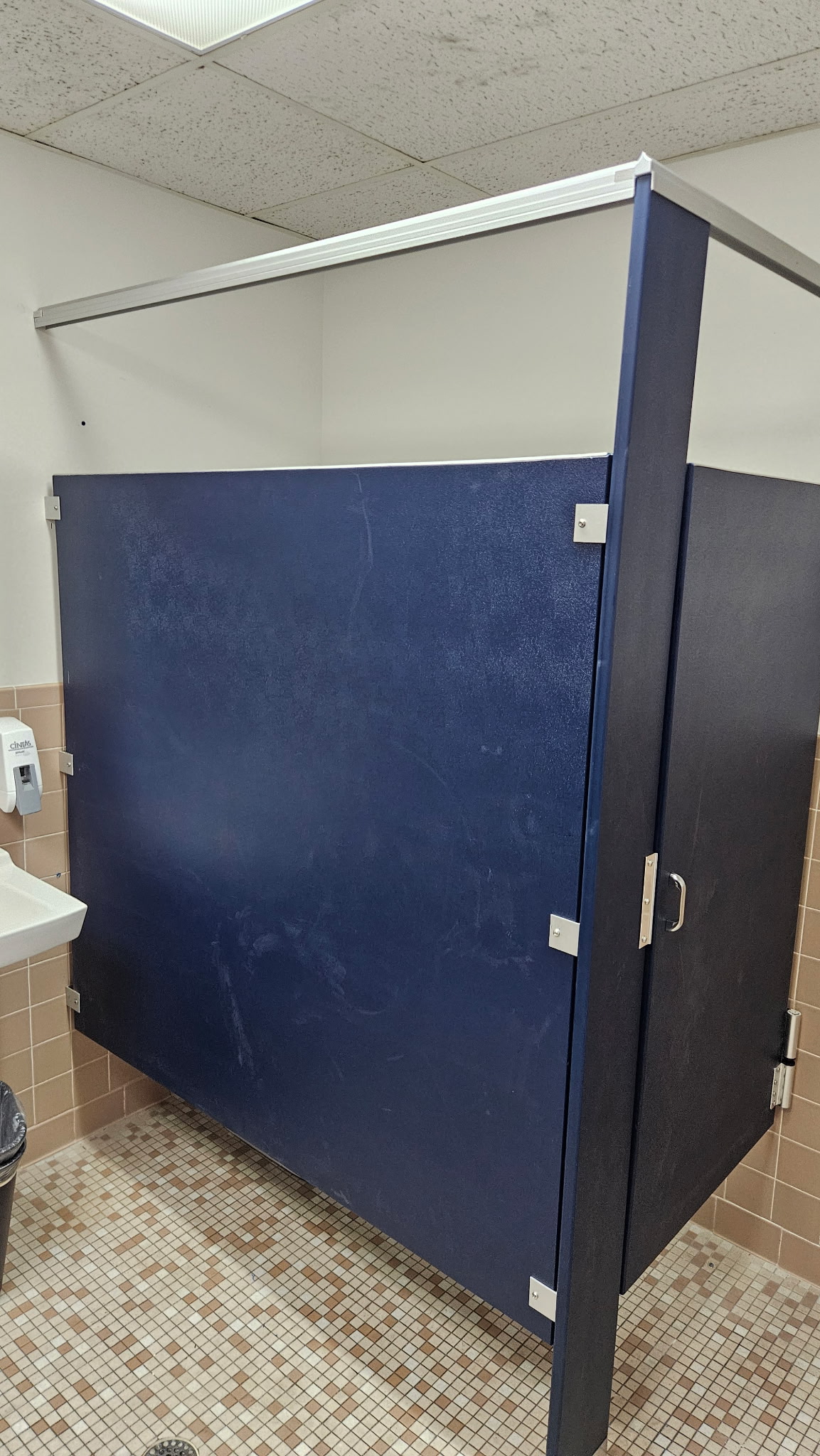 Solid-plastic commercial restroom stall and partition panel at Kloeckner Metals in Middletown, Connecticut