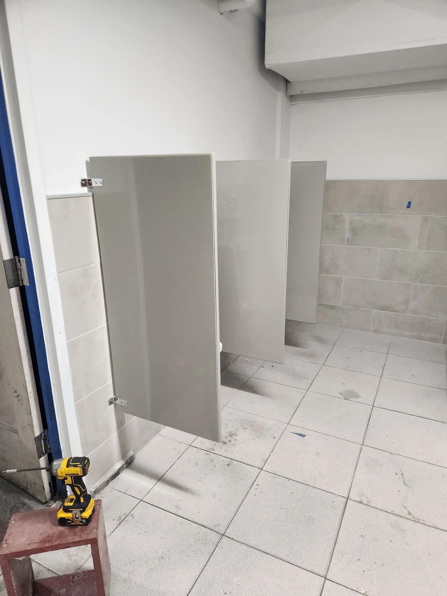 Additional view of commercial restroom stalls at Metropolitan Warehouse and Delivery in Perth Amboy, New Jersey