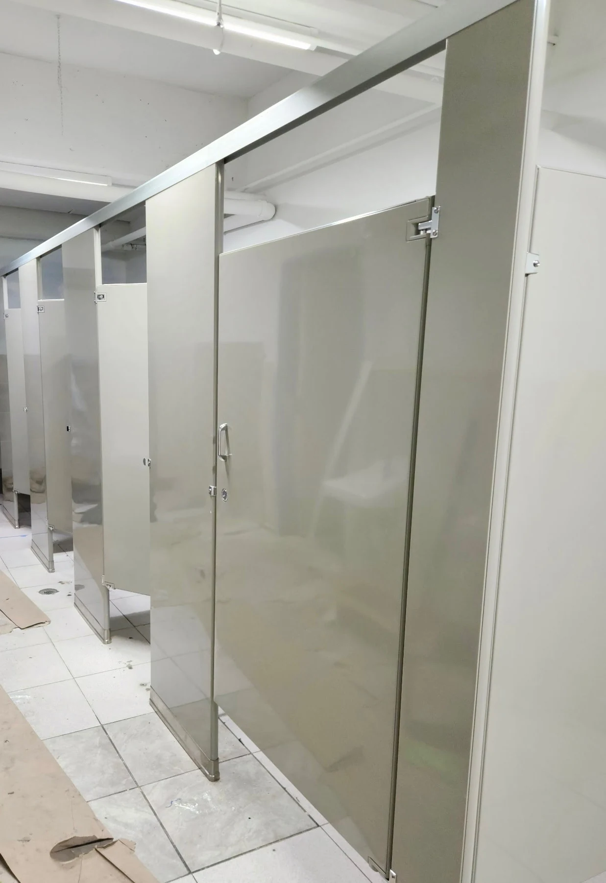 Commercial restroom stall row at Metropolitan Warehouse and Delivery in Perth Amboy, New Jersey