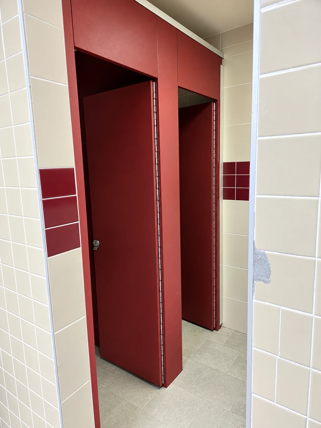 Additional view of Scranton Aria solid-plastic commercial restroom stalls at New Paltz High School in New Paltz, New York