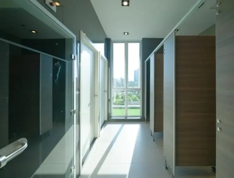 Mirrors, Hooks & Storage in a completed commercial restroom