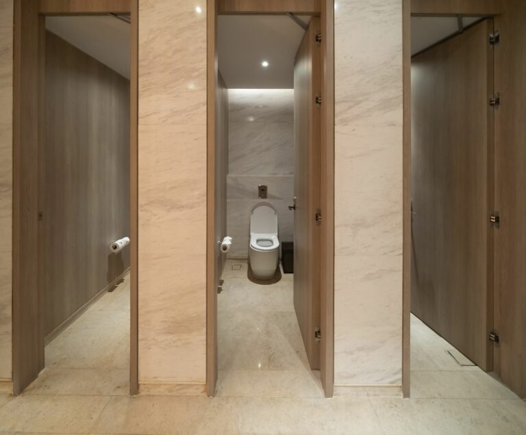 Public toilet. men bathroom doors in restroom in restaurant or hotel or shopping mall, empty interior decoration design